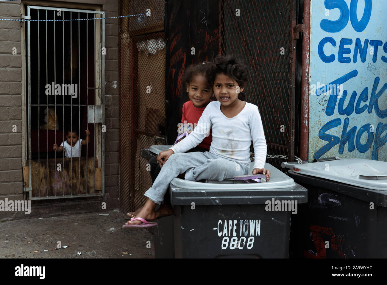 Children play in Hanover Park, one of the Cape Town areas plagued by gangsterism, a former 'Coloured' area during South Africa's apartheid era Stock Photo