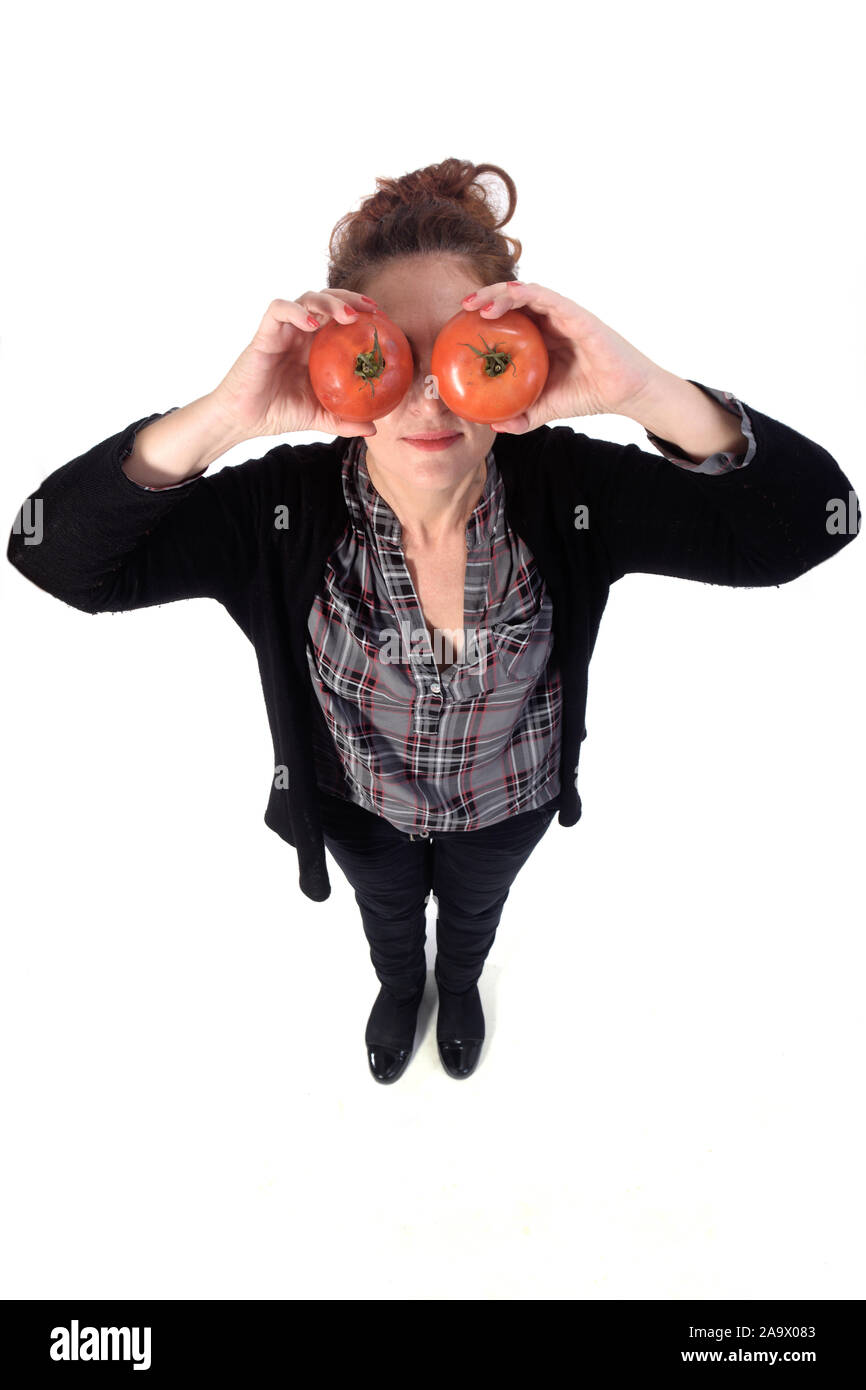 portrait of a woman with tomatoeson white background Stock Photo - Alamy