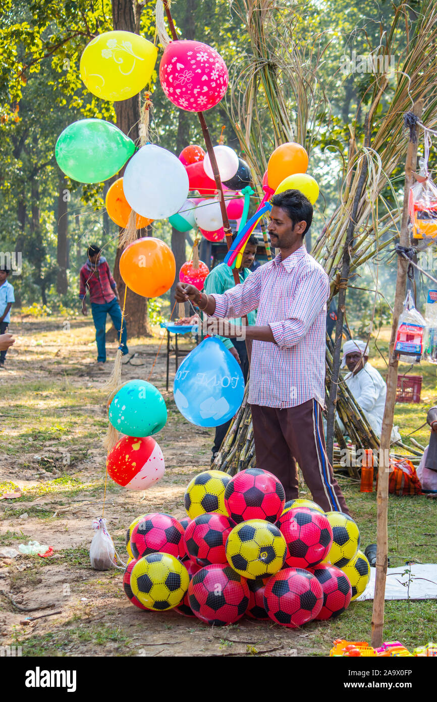 November,2019,Sijhora,India.Balloon seller sells balloon in the fair market  Stock Photo - Alamy