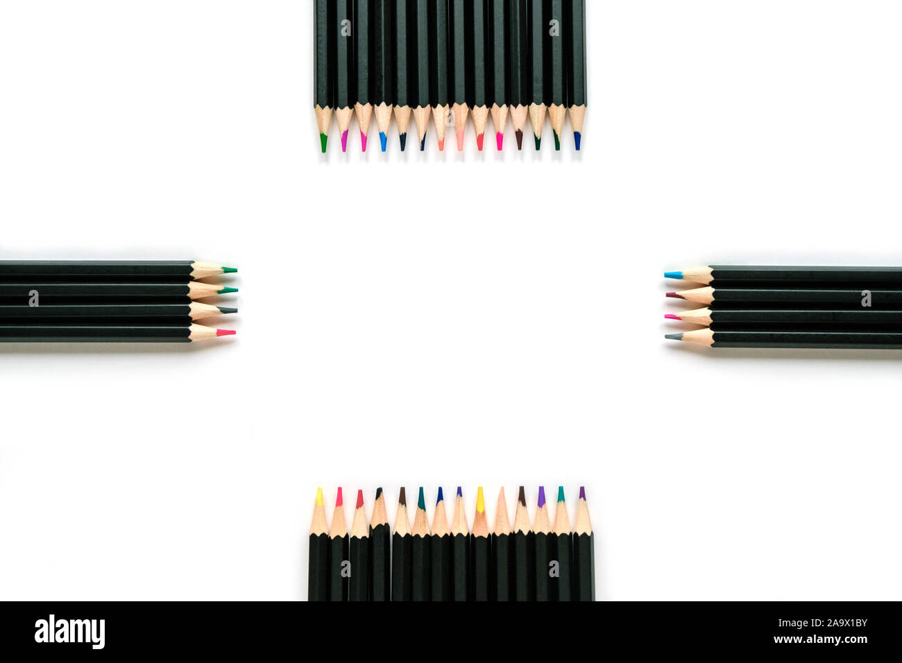 Colored pencils on white background. Isolate. Space for text Stock Photo