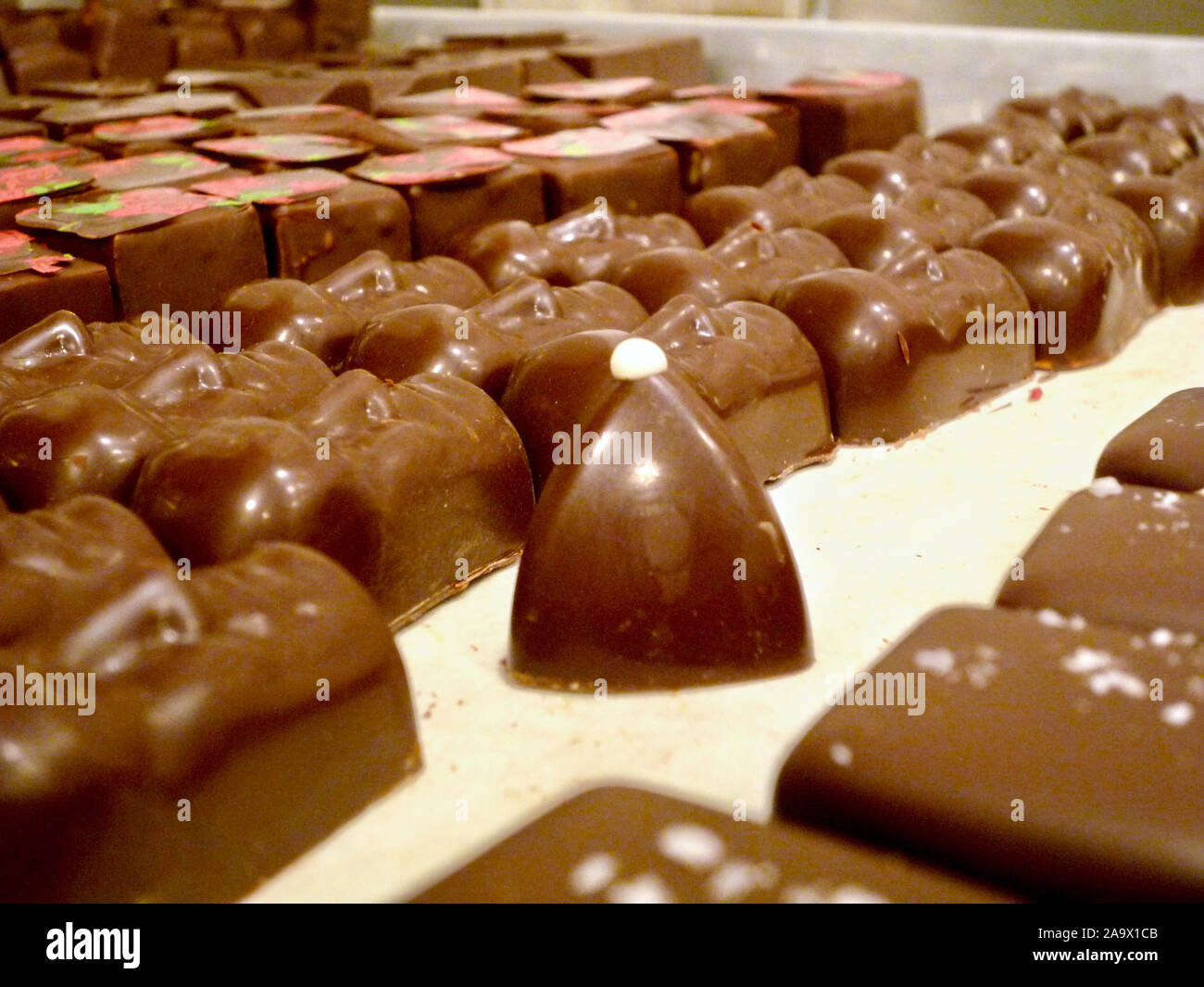 New York, USA. 01st July, 2019. The Yuzu chocolate designed by Sebastian  Brecht is offered for sale in the chocolate shop "Obessive Chocolate  Disorder" by Sebastian Brecht along with other chocolates. The