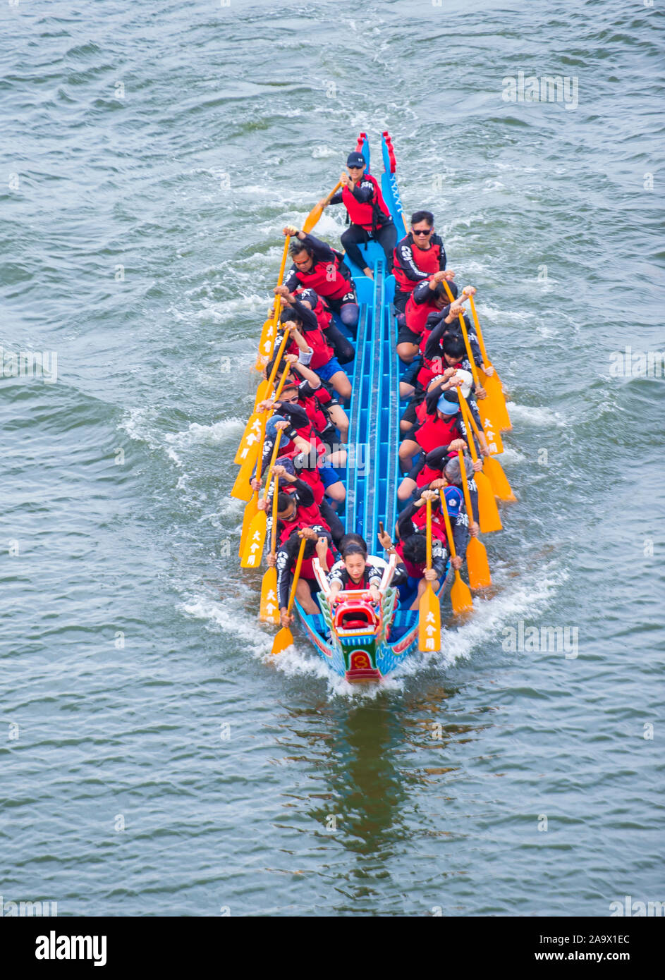 Dragonboat team racing during the 2019 Taipei Dragon Boat festival in Taipei Taiwan. Stock Photo