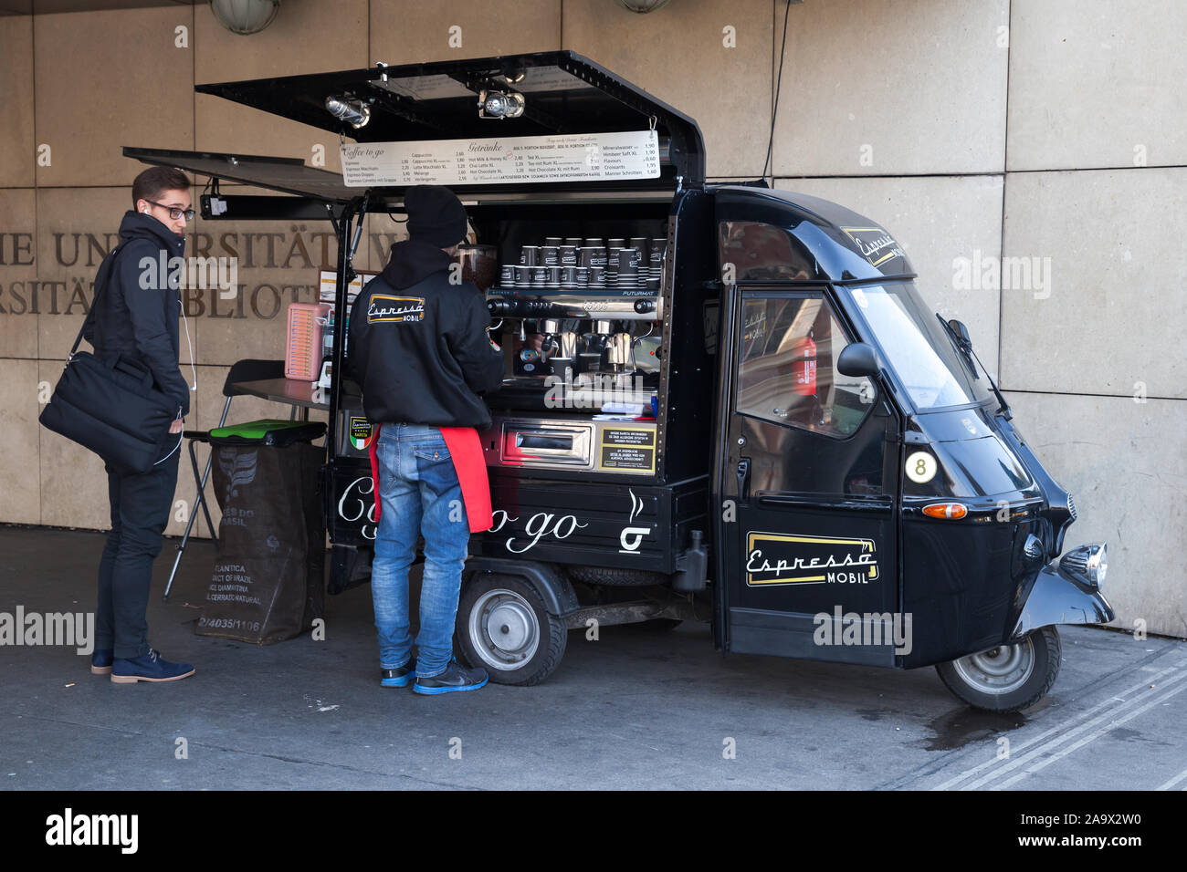 Vienna, Austria - November 4, 2015: Customer and barista of Espresso Mobil coffee to go are on the street of Vienna Stock Photo