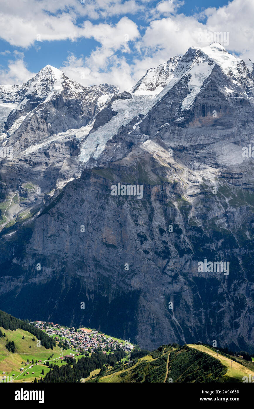 View across the Lauterbrunnen Valley to the Eiger, Mönch, Jungfrau and the village of Mürren from the Schilthorn summit, Switzerland Stock Photo