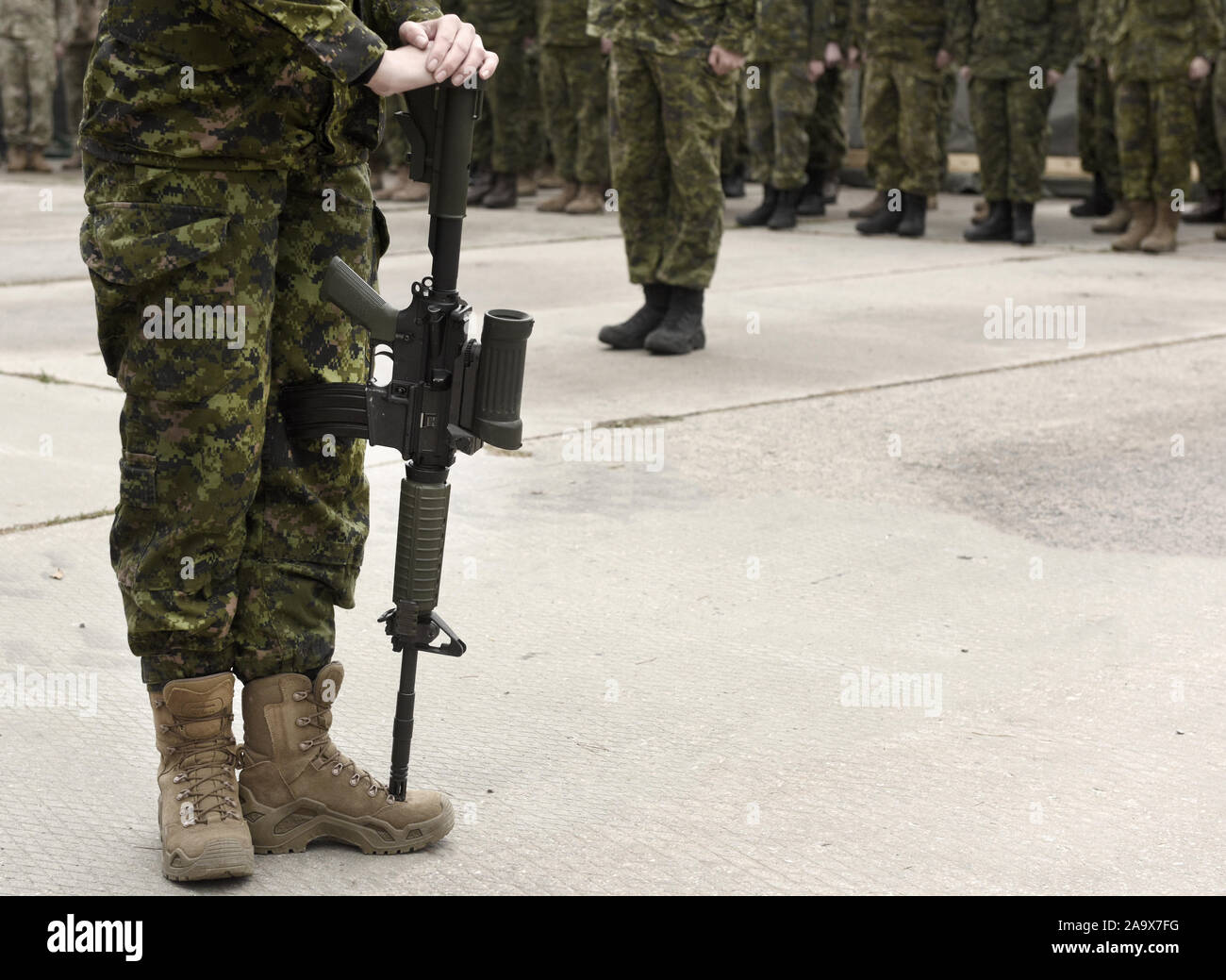 Soldier with weapon. Armistice. Armed forces, troops, army. Military concept. Empty space for text Stock Photo