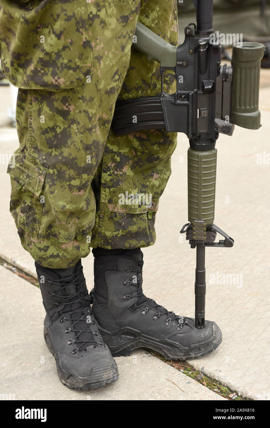 Soldier with weapon. Armistice. Armed forces, troops, army. Military concept. Stock Photo