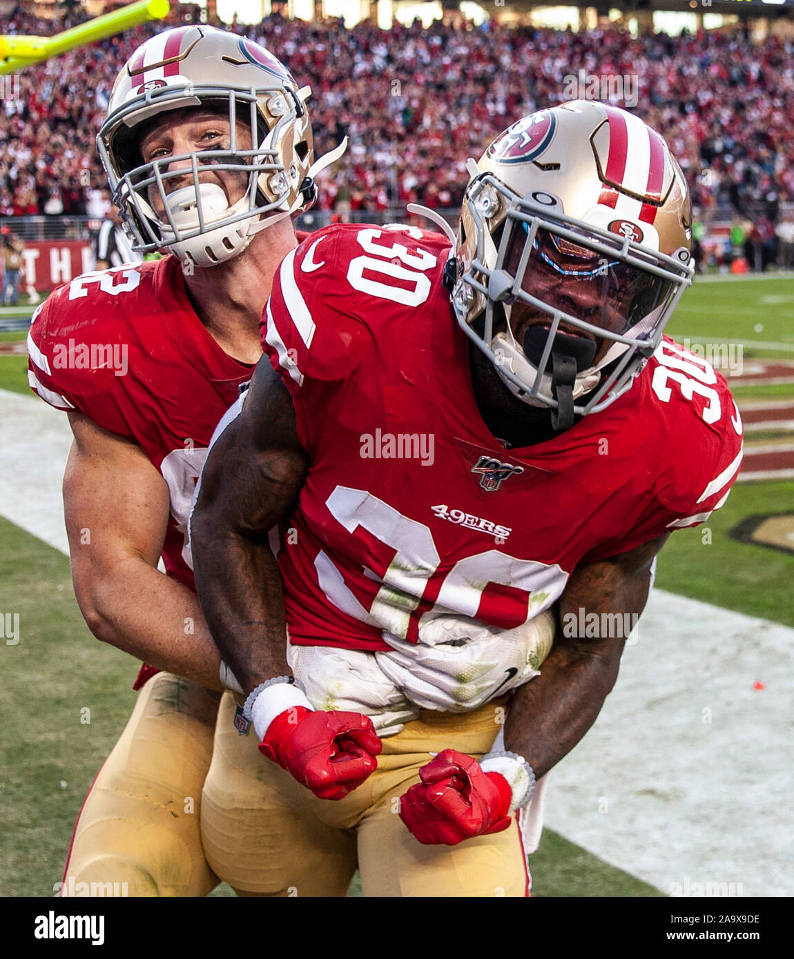 Santa Clara, California, USA. 17th Nov, 2019. San Francisco running back Jeff Wilson (30)scores on a 25 yard touchdown reception celebrate with teammate tight end Ross Dwelley (82) during the NFL Football game between the Arizona Cardinals and the San Francisco 49ers 36-26 win at Levi Stadium Santa Clara Calif. Thurman James/CSM Credit: Cal Sport Media/Alamy Live News Stock Photo