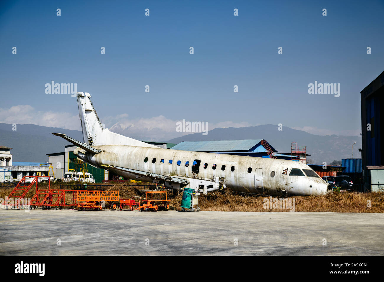 Scrapped airplane at Kathmandu airport in Nepal Stock Photo