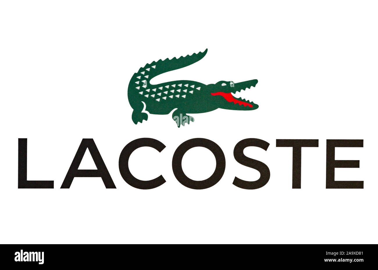Paris - August 21, 2019: Lacoste logo is seen on a white background in Paris. Stock Photo