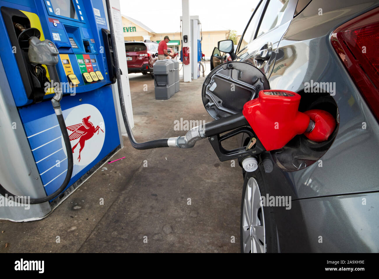 filling a car with petrol mobil gas station florida usa Stock Photo
