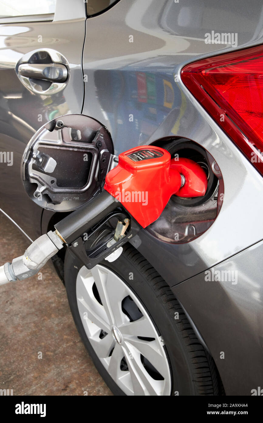 filling a car with petrol gas station florida usa Stock Photo