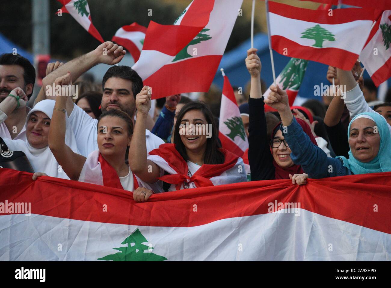 *** STRICTLY NO SALES TO FRENCH MEDIA OR PUBLISHERS *** November 17, 2019 - Beirut, Lebanon: Lebanese women join mass protests on Martyrs' Square to celebrate one month since the beginning of the Lebanese revolution. Des Libanaises participent aux manifestations pres de la Place des Martyrs pour feter un mois de soulevement populaire. Stock Photo