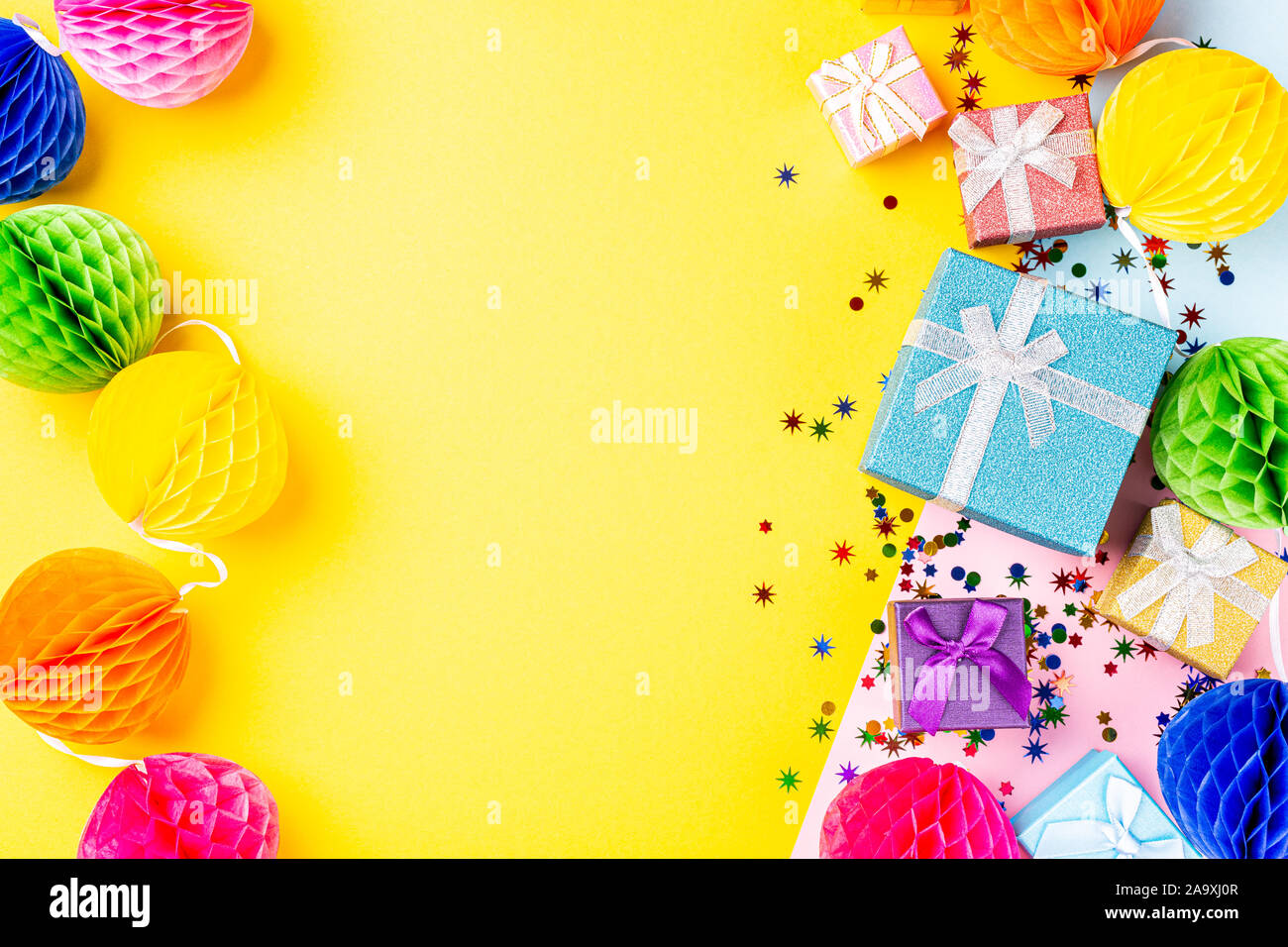 Festive background with colorful gift presents Stock Photo - Alamy