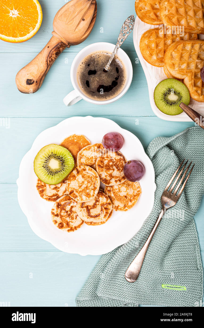 Dutch mini pancakes called poffertjes Stock Photo