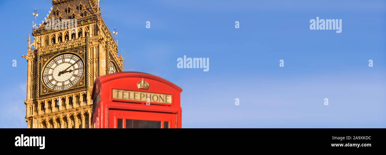 Red telephone box and Big Ben,  panoramic background of London, UK Stock Photo
