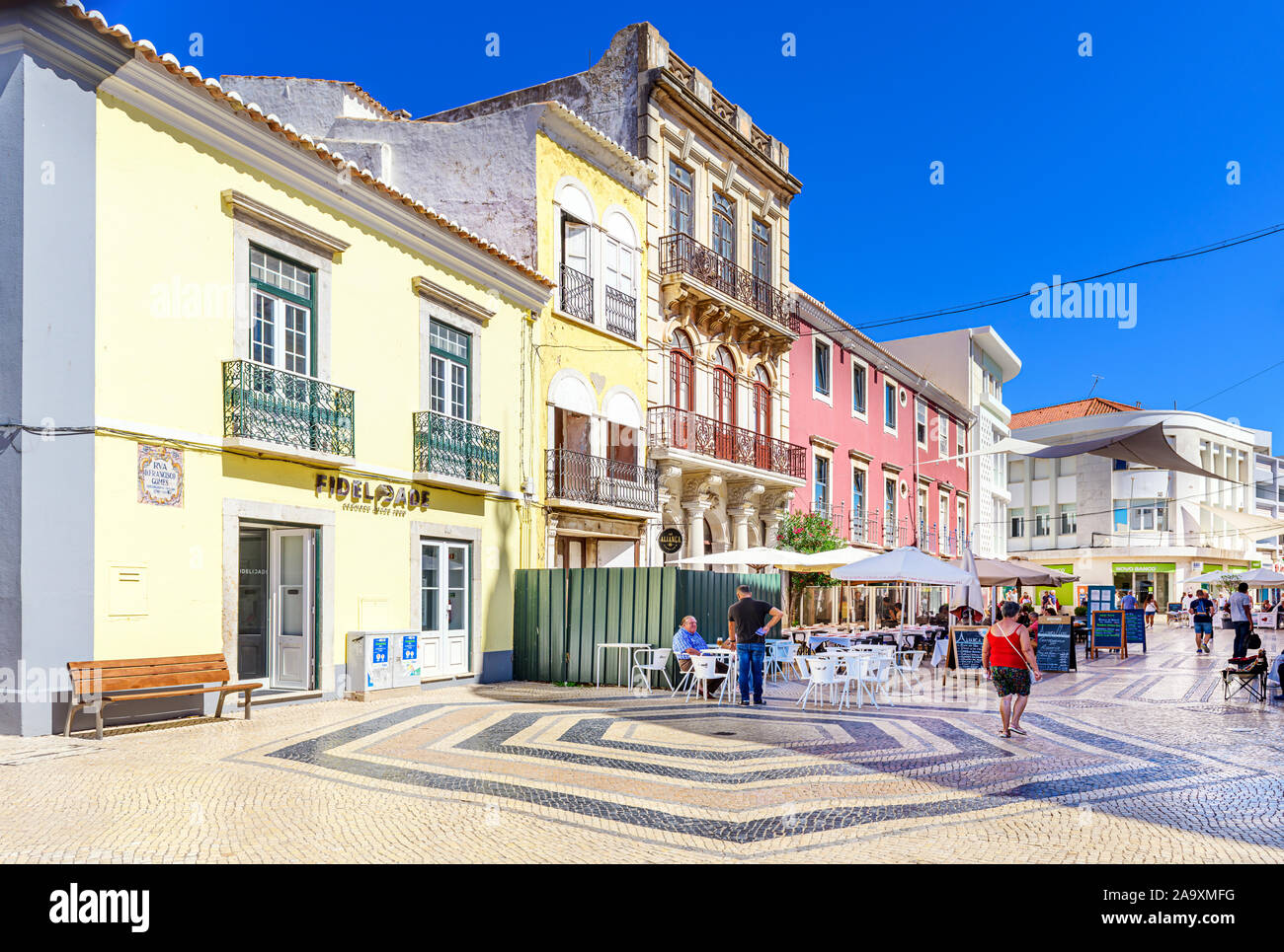 Outside Faro restaurants and shops in the Rua D. Francisco Gomes. Faro, Algarve, Portugal. Stock Photo