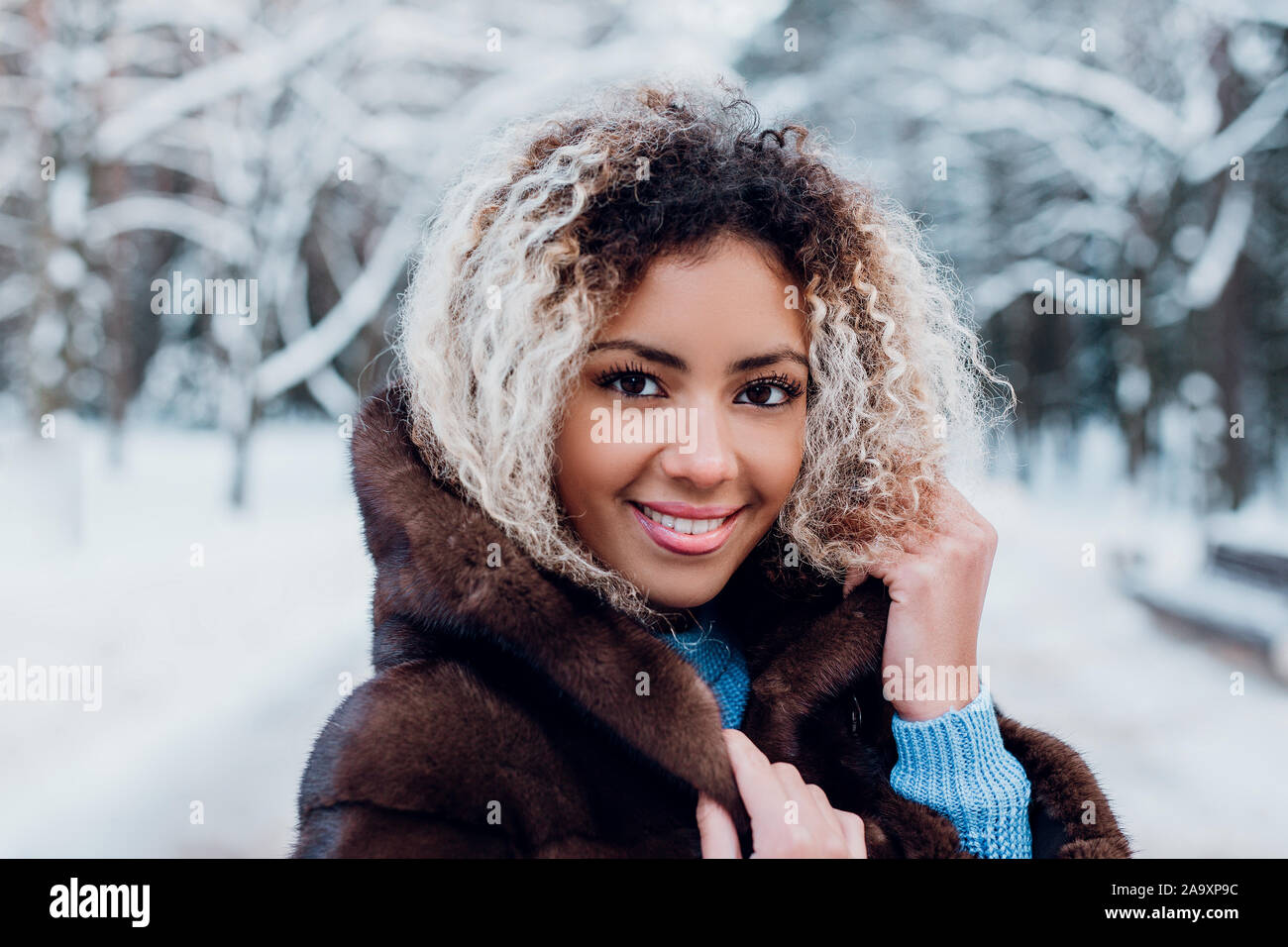 African woman wearing coat fur hi-res stock photography and images - Alamy