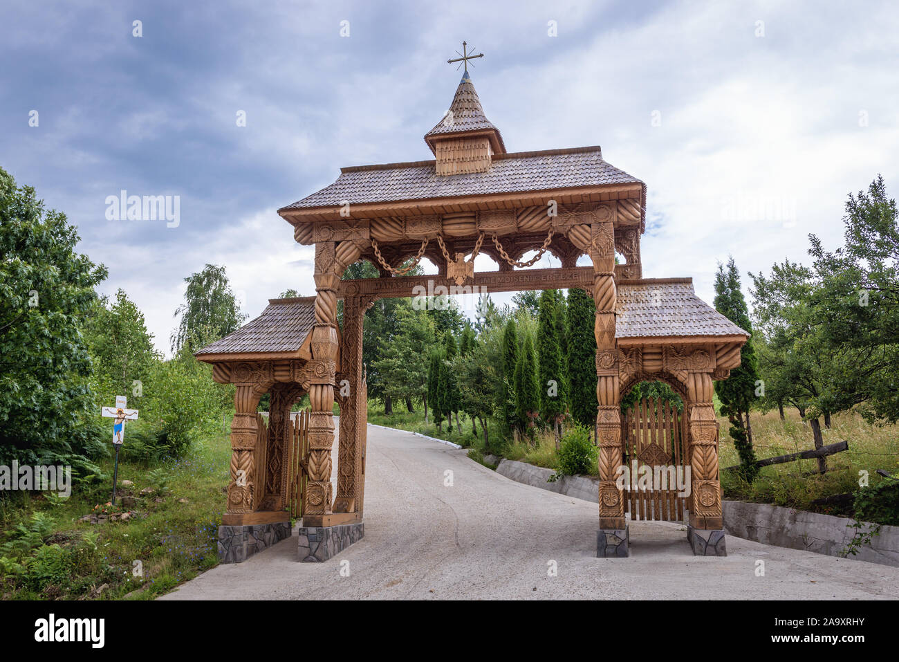 Entry gate of Monastery of Holy Trinity near Huta-Certeze village located in Satu Mare County, Romania Stock Photo