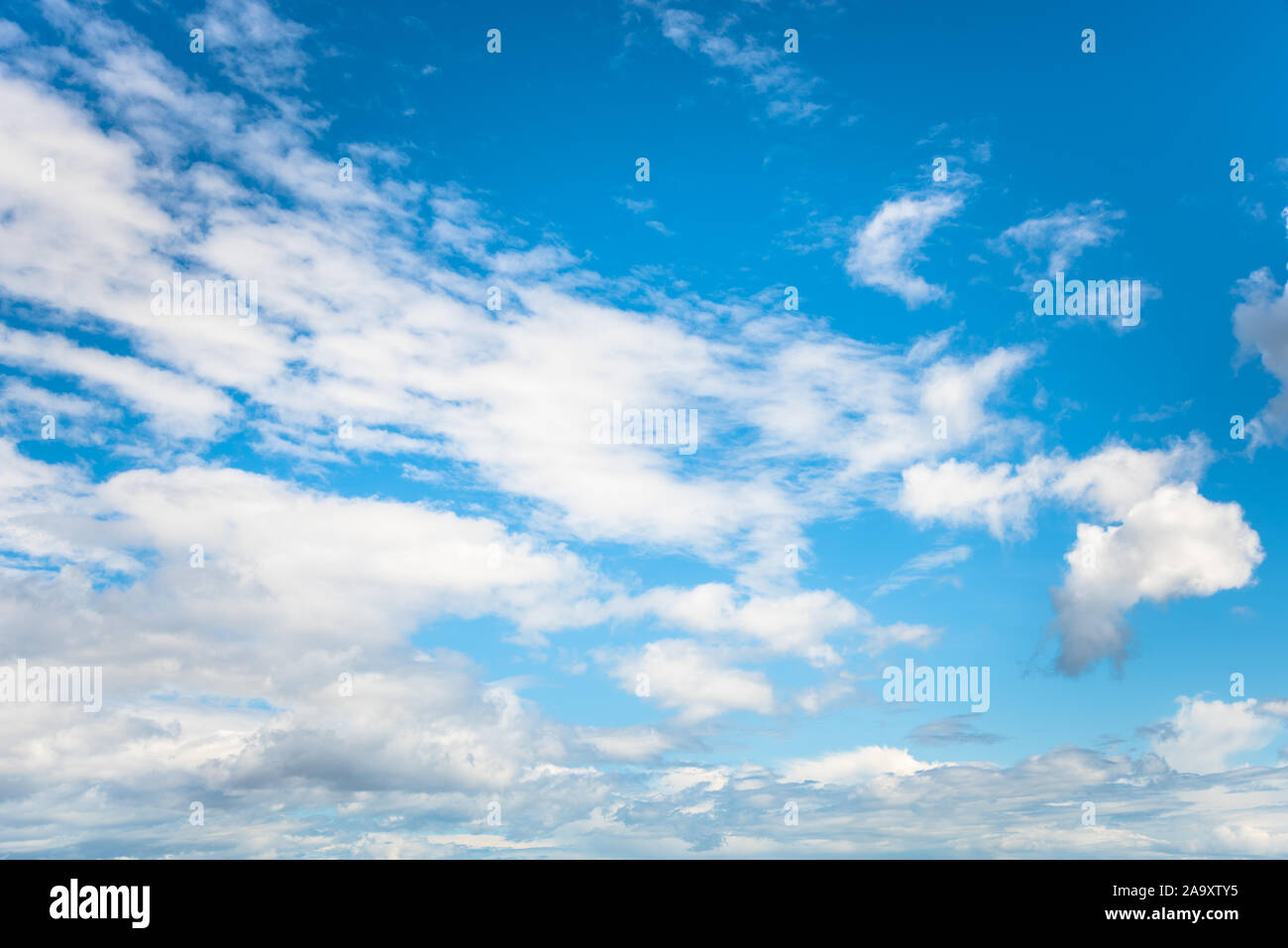 Low angle view of of blue sky with clouds. Sky background Stock Photo ...
