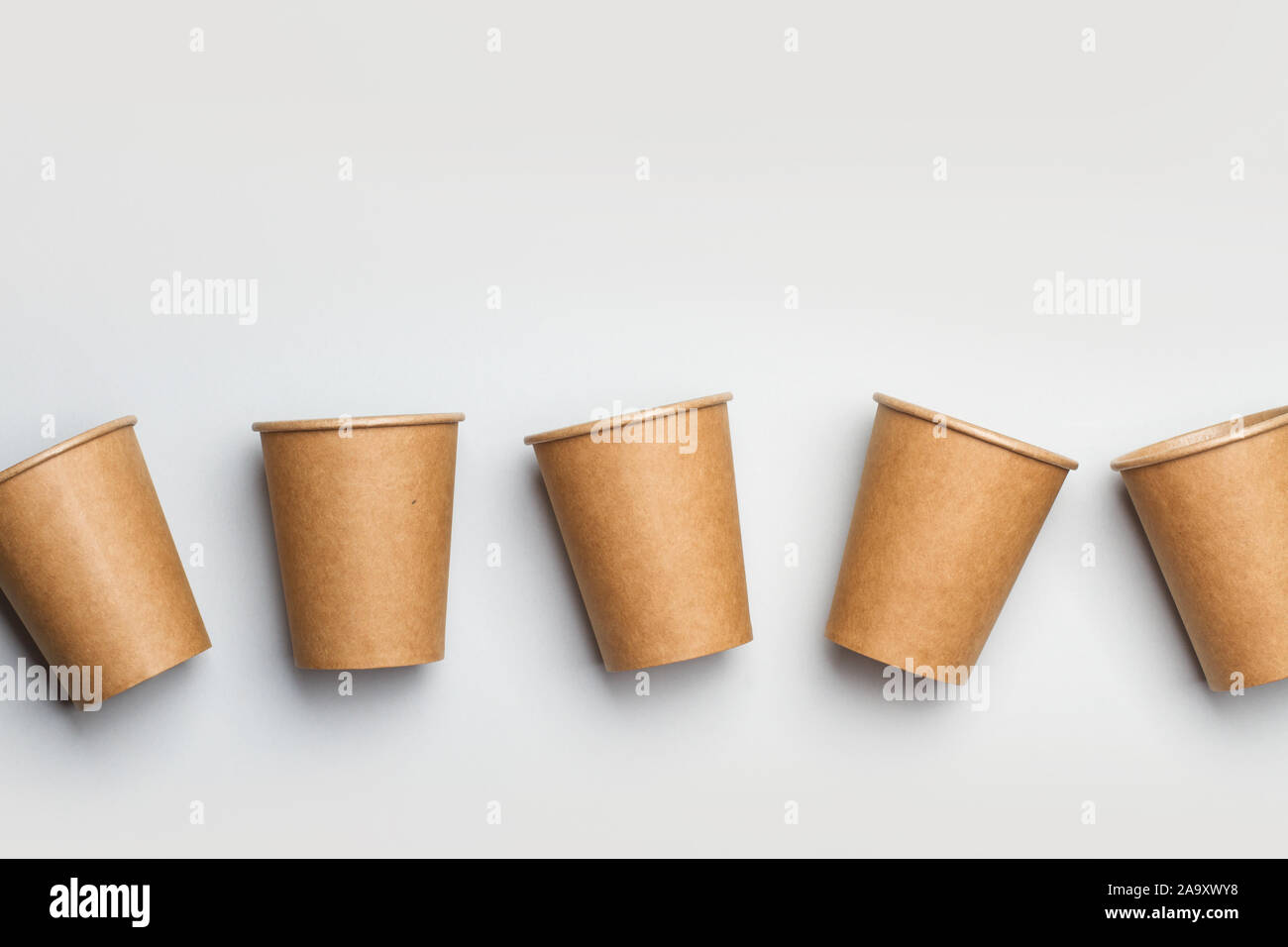 Paper cups on a gray background Stock Photo