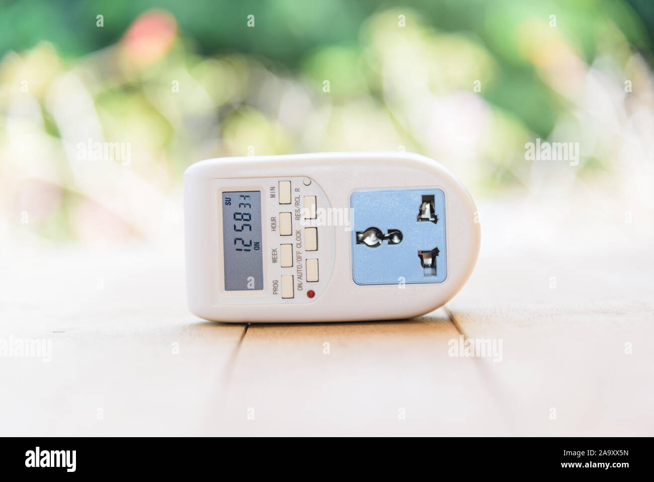 Digital electric plug timer for auto ON/OFF electronics Stock Photo - Alamy