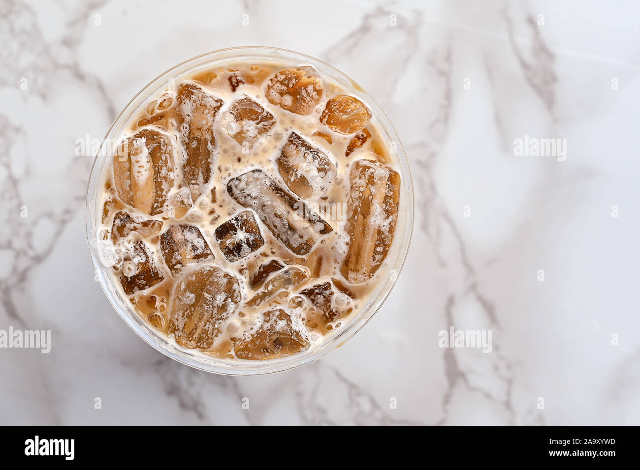 Iced coffee in cup plastic top view close up Stock Photo