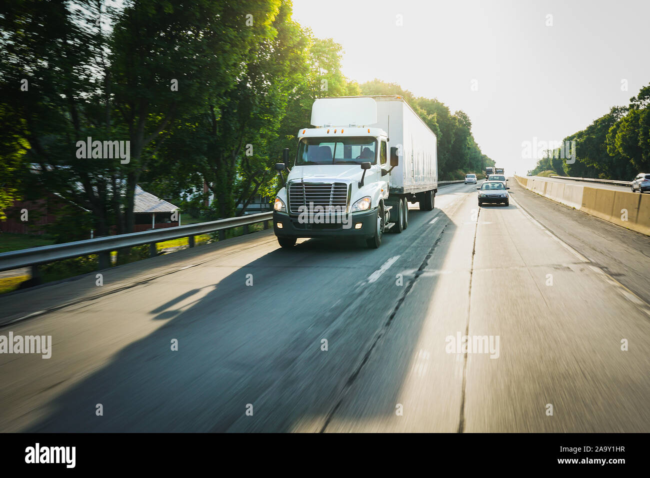 Commercial freight truck shipping goods on the highway Stock Photo