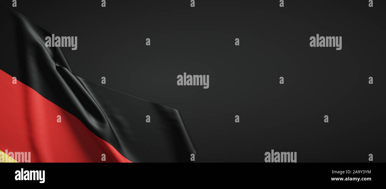 Germany flag fabric on plain dark background Stock Photo