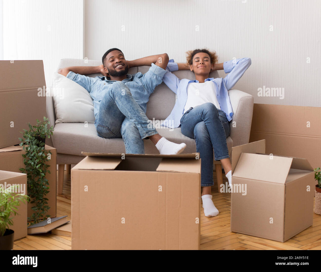 African Couple Sleeping On Sofa High Resolution Stock Photography and ...