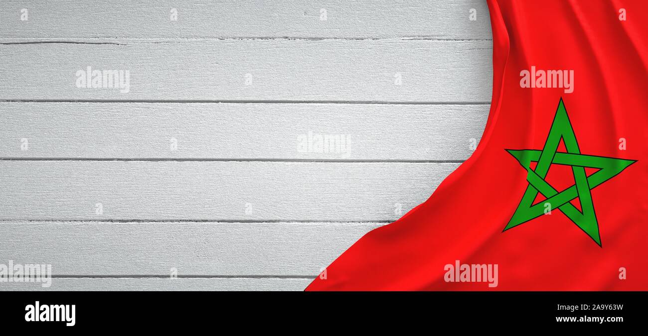 Morocco flag, on top of white wood. Wrinkled fabric Stock Photo - Alamy