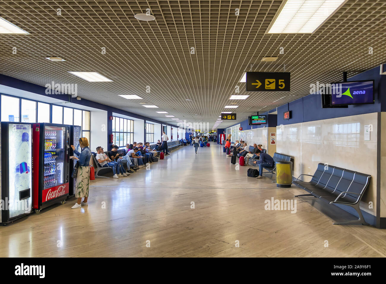 Seville, Spain - May 23, 2019:  Waiting area and access gates to board at the Seville airport Stock Photo