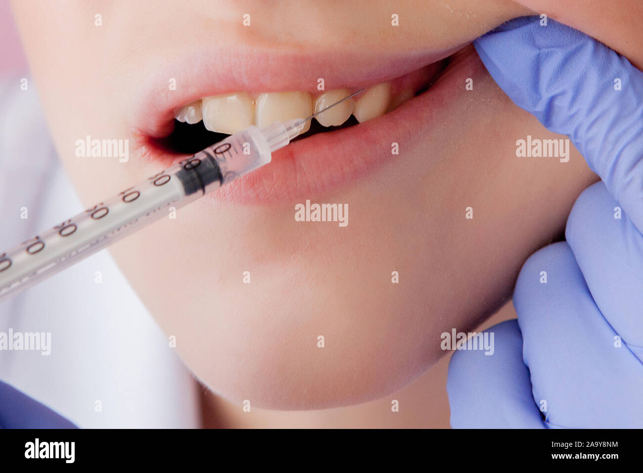 Closeup portrait terrified girl woman scared of needles, syringes