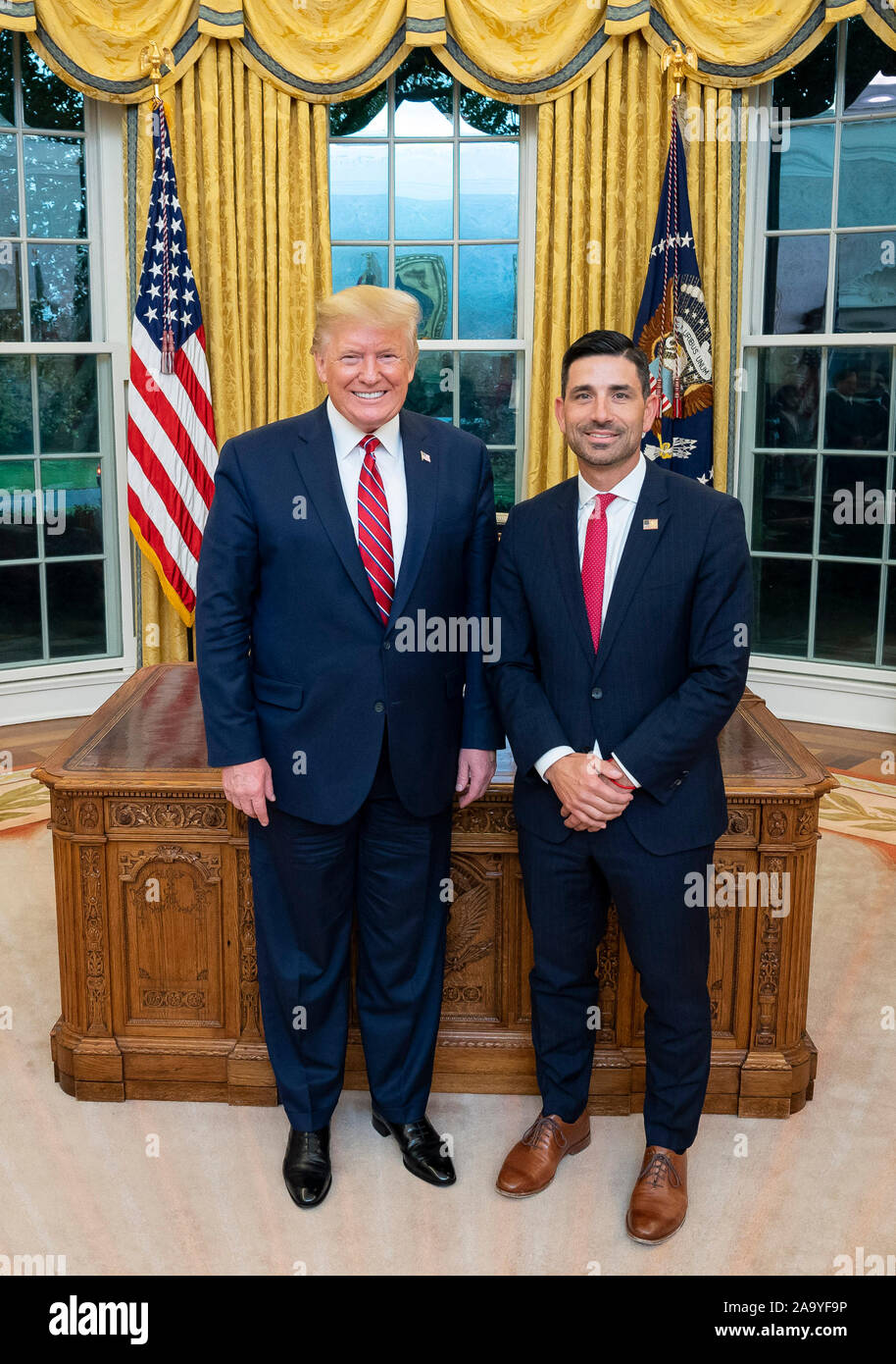 President Donald J. Trump welcomes Department of Homeland Security Undersecretary Chad Wolf to the Oval Office for Wolf’s ceremonial swearing-in Friday, Nov. 15, 2019, at the White House. Stock Photo