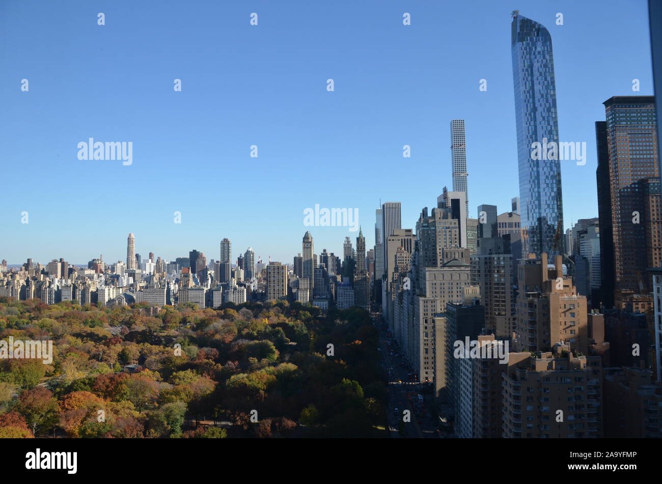 New York City Manhattan midtown view with skyscrapers and blue sky in ...