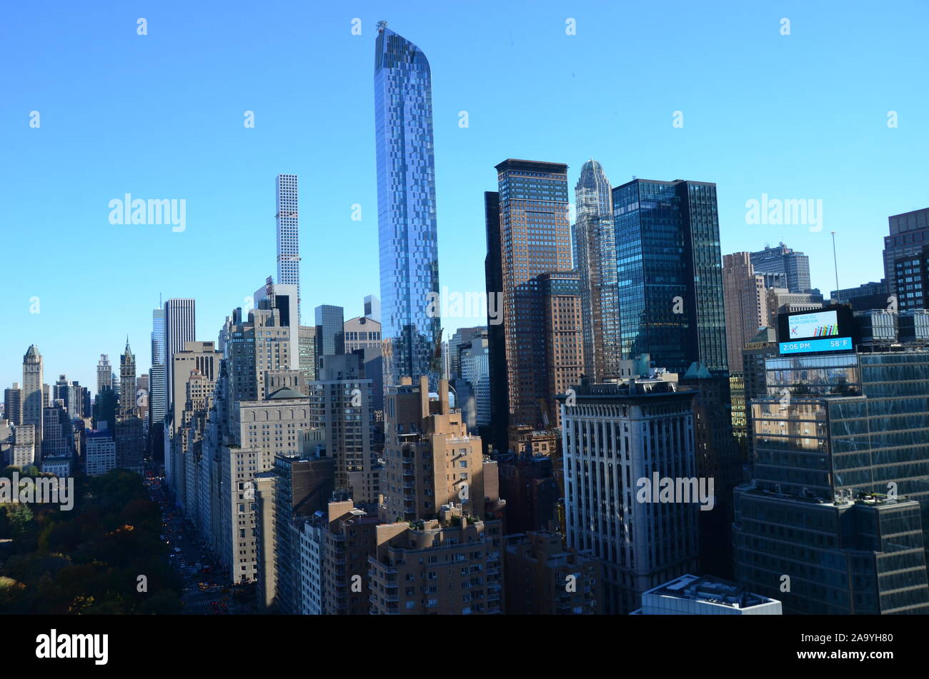 New York City Manhattan midtown view with skyscrapers and blue sky in ...
