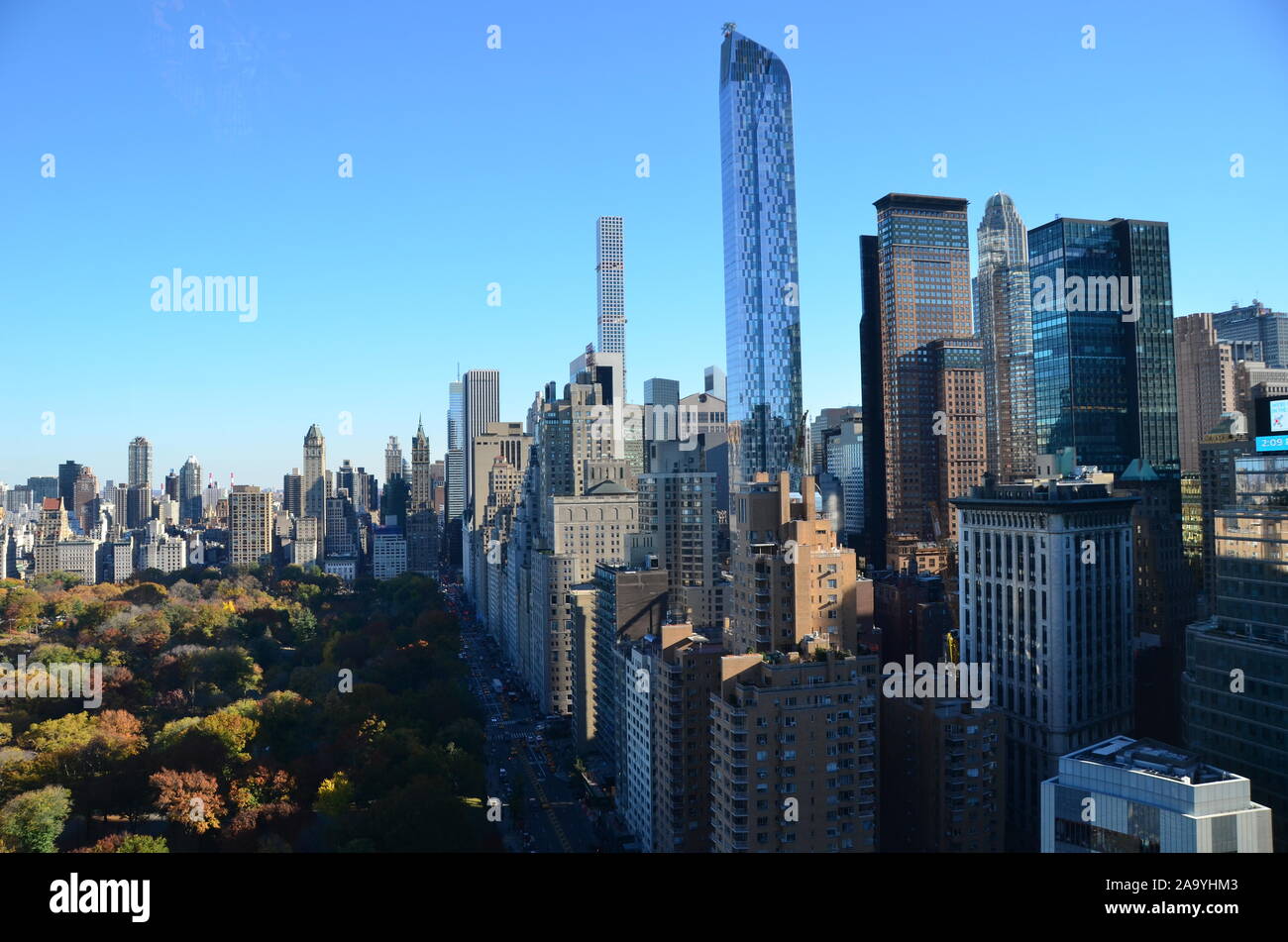 New York City Manhattan midtown view with skyscrapers and blue sky in ...