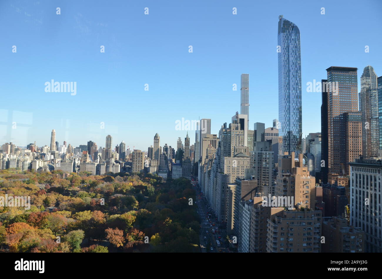 New York City Manhattan midtown view with skyscrapers and blue sky in ...