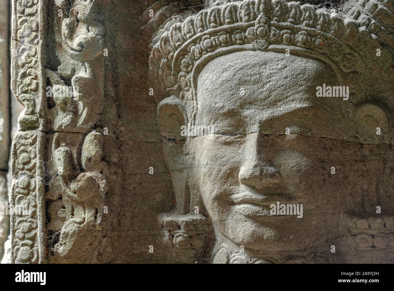 Stone carving of a face at the famous Angkor Wat Temple in Cambodia
