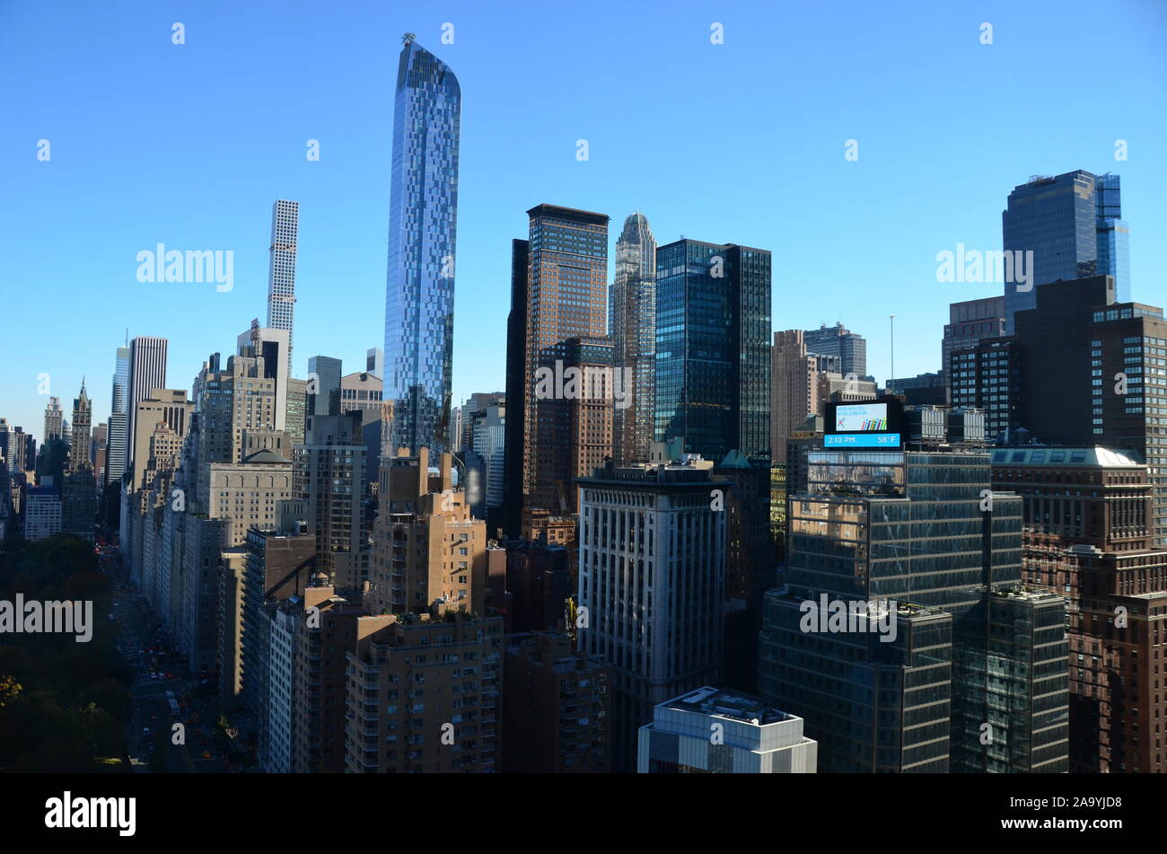 New York City Manhattan midtown view with skyscrapers and blue sky in ...
