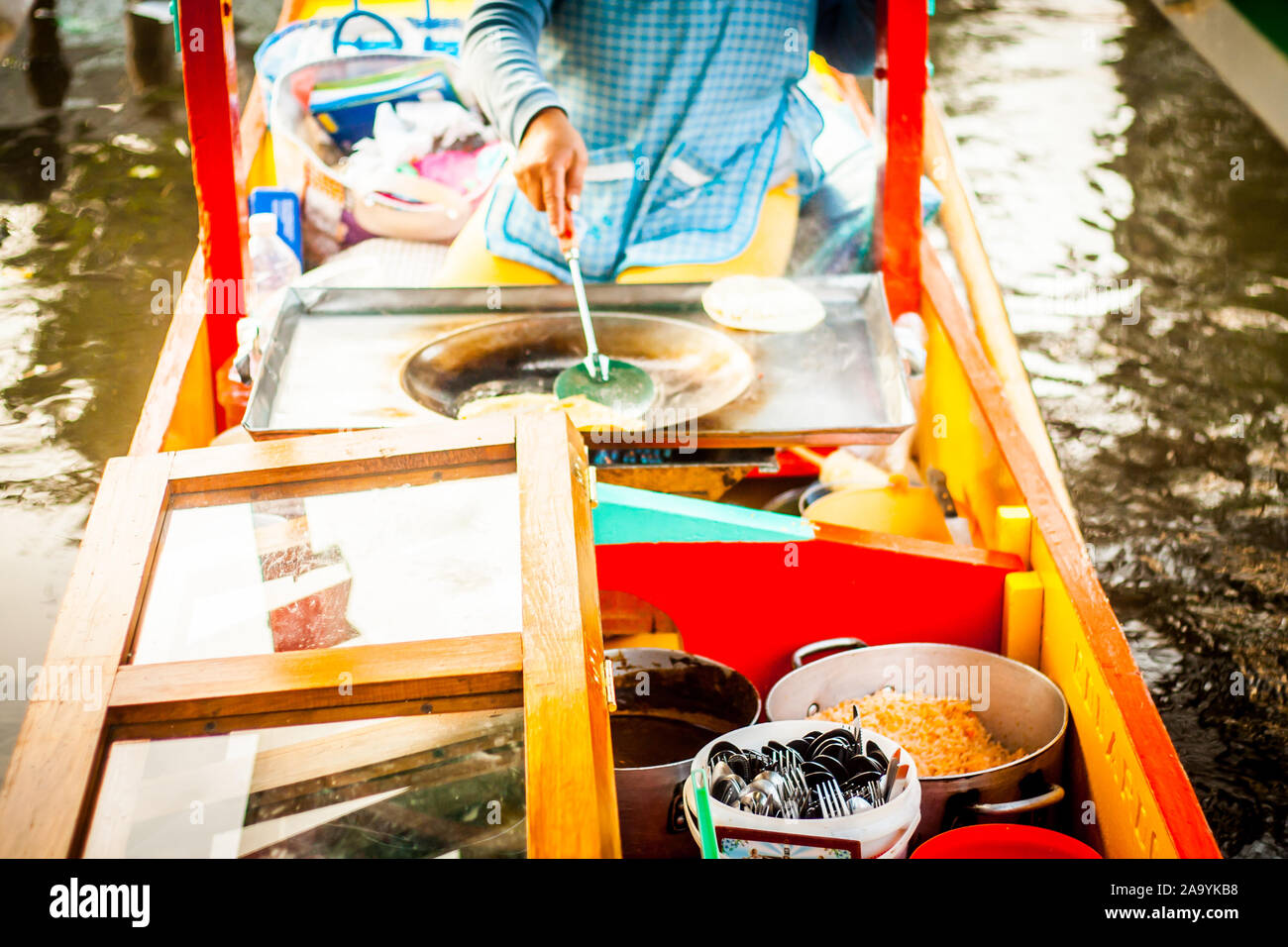 Mexican vendor of food on Xochimilco gondola trajinera Stock Photo