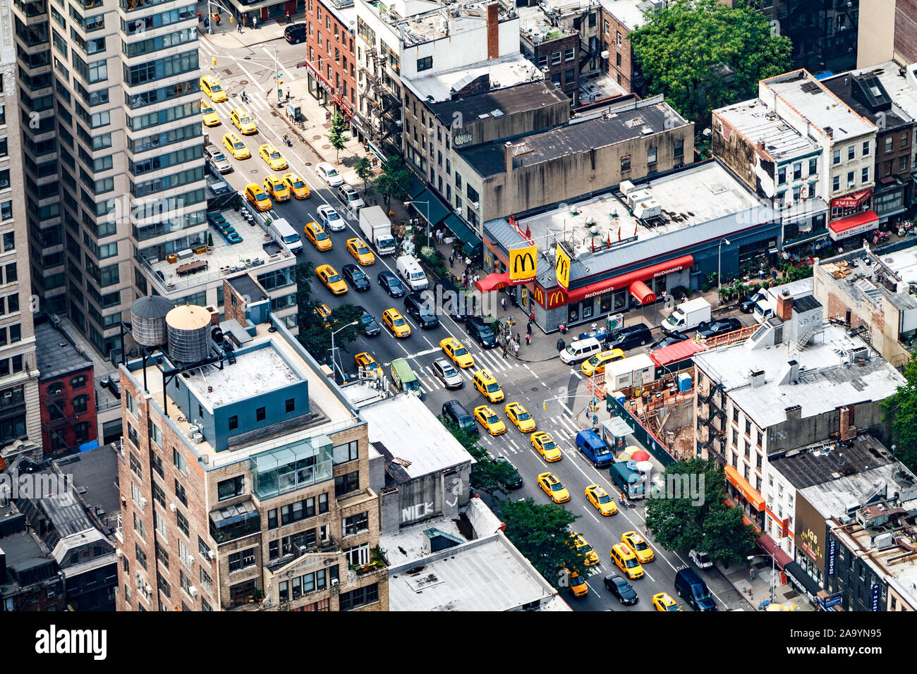 A row of cabs on 6th Avenue in Midtown Manhattan Stock Photo