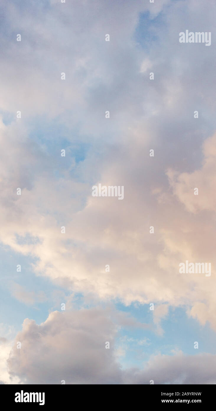 Blue sky with clouds just before sunset Stock Photo - Alamy