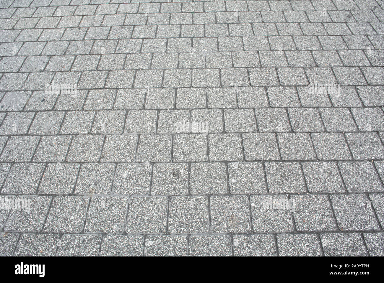 gray square texture or porous tile pavement or floor background Stock