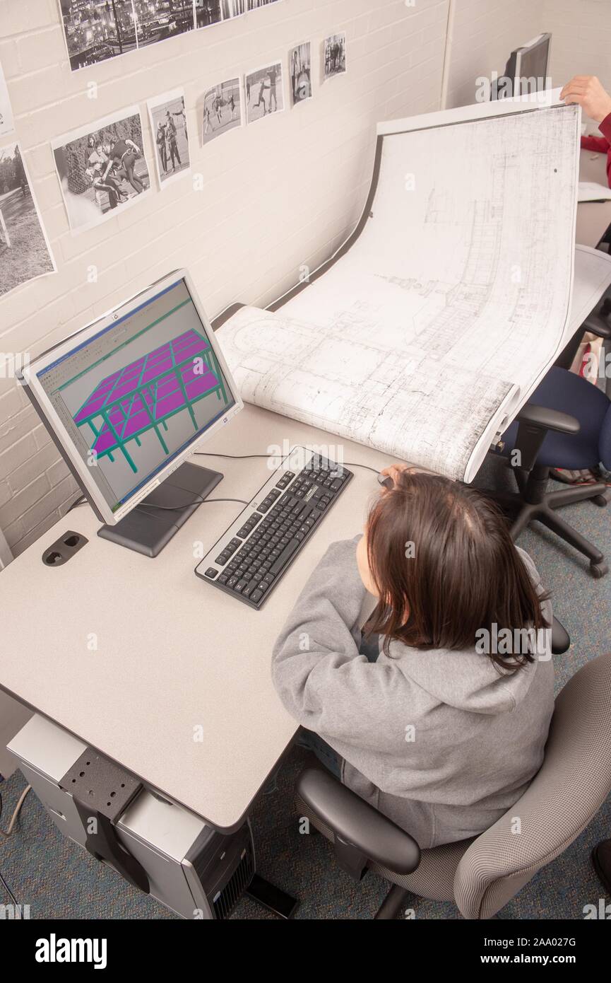 High angle shot of a person working with design software on a computer in the Whiting School of Engineering at the Johns Hopkins University, Baltimore, Maryland, March 3, 2009. From the Homewood Photography Collection. () Stock Photo