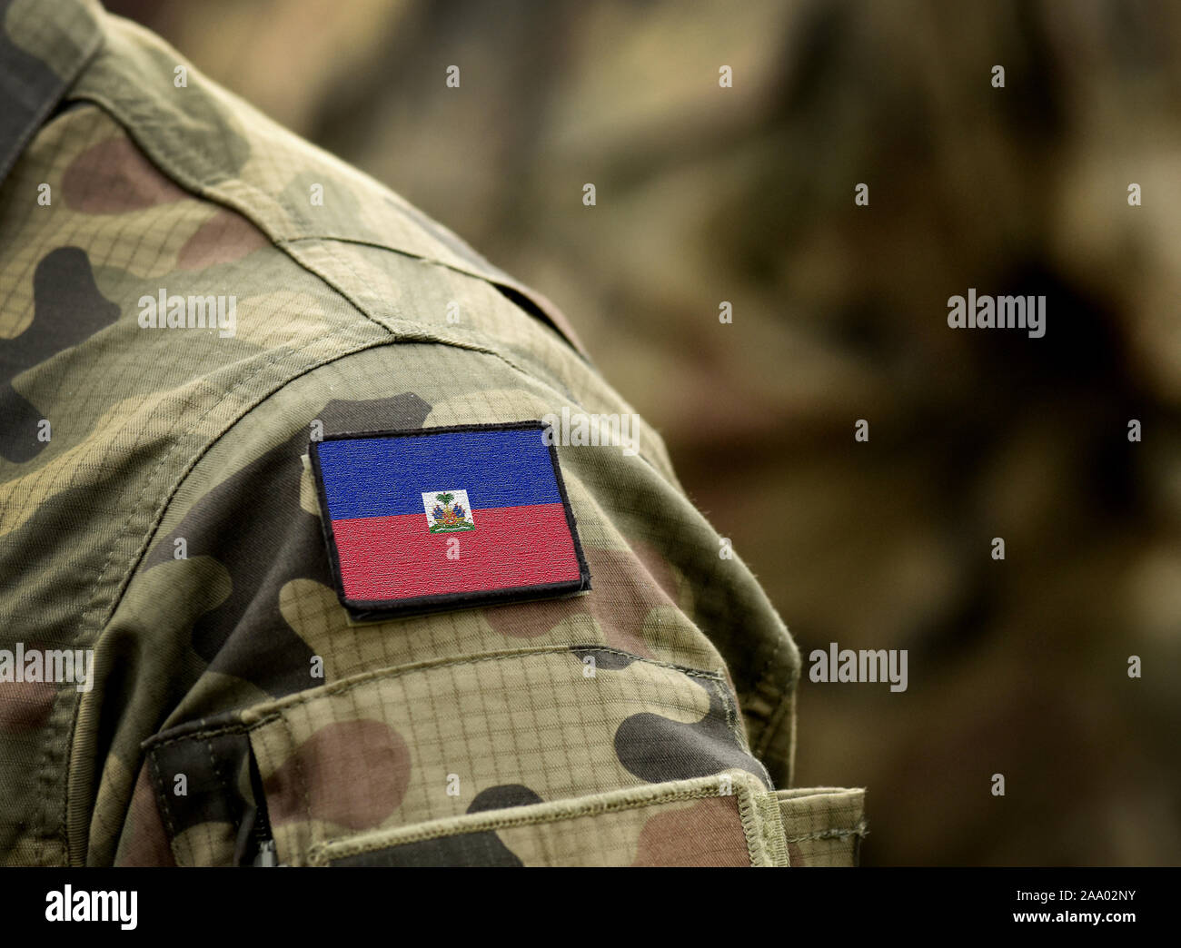 Flag of Haiti on military uniform. Army, armed forces, soldiers. Collage. Stock Photo
