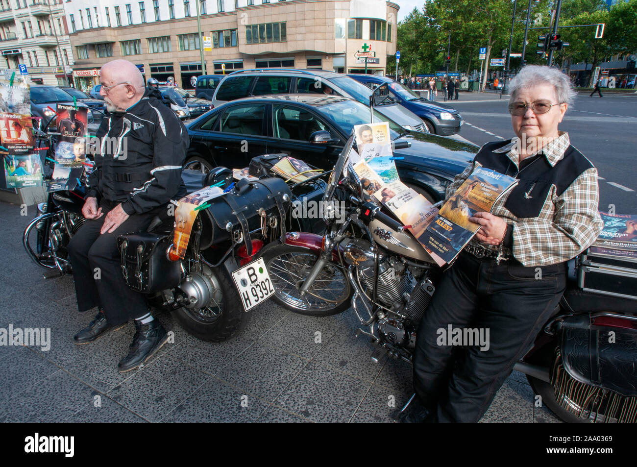 Harley davidson bikers and Jehovah's Witnesses in Neues Kranzler Eck, Berlin-Charlottenburg, Berlin, Germany, Europe Stock Photo
