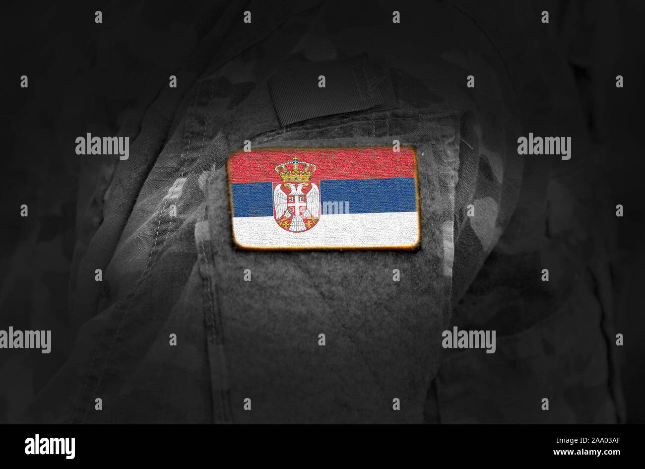 Flag of Serbia on military uniform. Army, armed forces, soldiers. Collage. Stock Photo