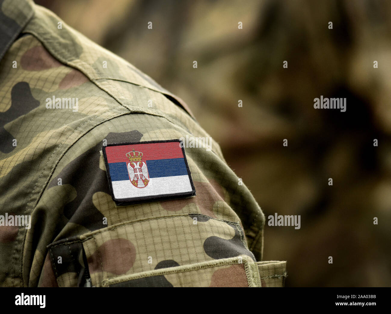 Flag of Serbia on military uniform. Army, armed forces, soldiers. Collage. Stock Photo