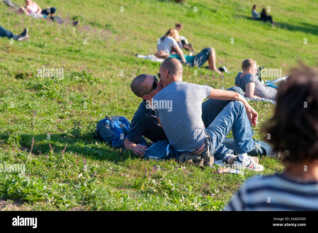 People enjoy at Mauerpark Prenzlauer Berg in Berlin Germany Stock Photo