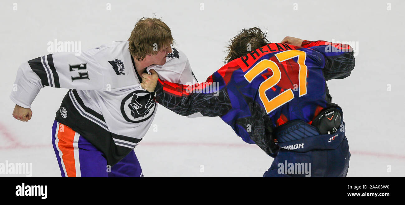 Orlando Solar Bears defenseman Rich Boyd (24) fights with Jacksonville  Icemen forward James Phelan (27) during the third period of an ECHL  professional hockey game at Veterans Memorial Arena in Jacksonville, Fla.,